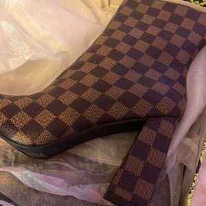 New never worn mocha and black booties.